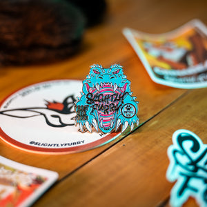 Slightly Furry Frostbite 2025 collectors pin with FetchNW logo