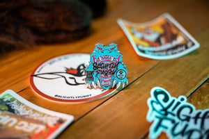 Slightly Furry Frostbite 2025 collectors pin with FetchNW logo